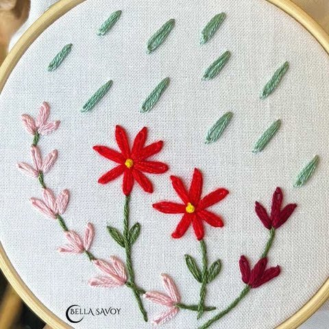 rain and flower embroidery made with the lazy daisy stitch