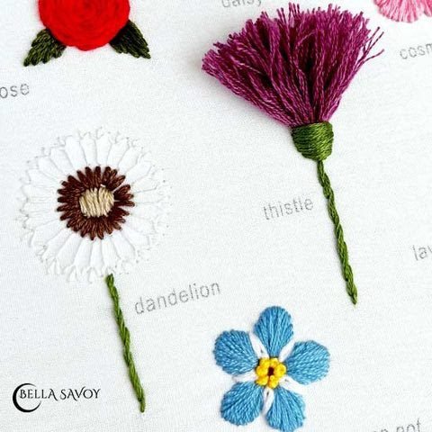 flower embroidery including a rose, thistle, dandelion, and a forget-me-not for the stitch along
