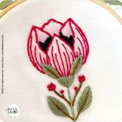 flower embroidery with petals colored in with crayon