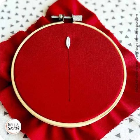 small stitch holding down the loop