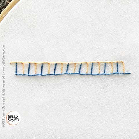 double blanket stitch in blue and yellow