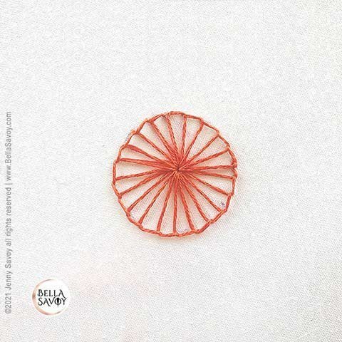 flower blanket stitch variation in the shape of a pinwheel