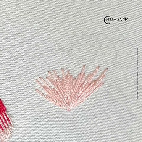 bottom of a heart with long and short stitch filled in pink