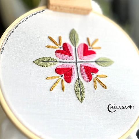 finished flower embroidery stitch along pattern created with easy basic stitches from a free flower embroidery pattern.